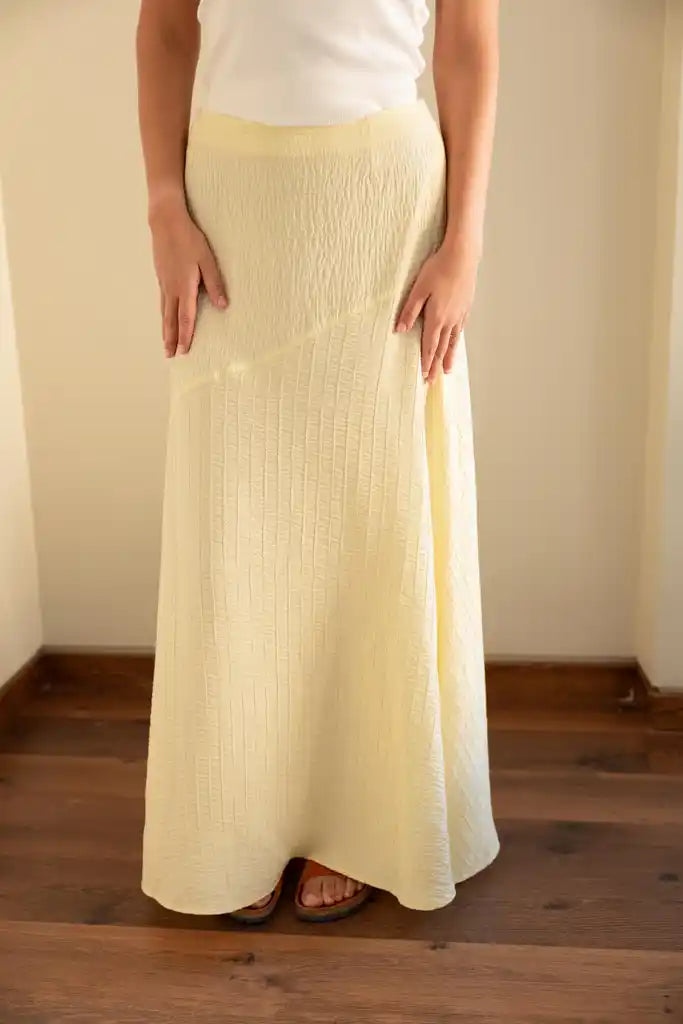 Flow Asymmetrical skirt in butter yellow